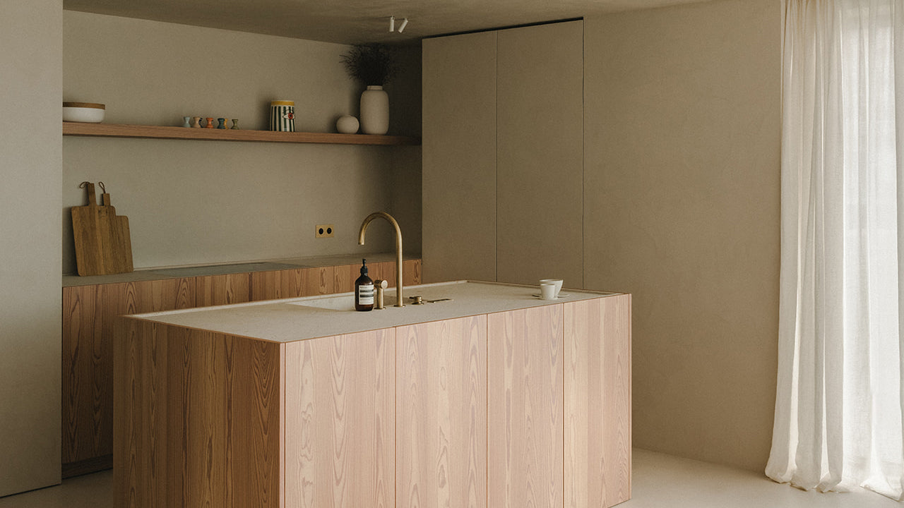 Modern kitchen with wooden island and neutral color palette