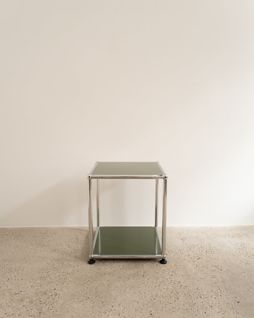 USM Haller side table olive, in AM Designs showroom, Antwerpen