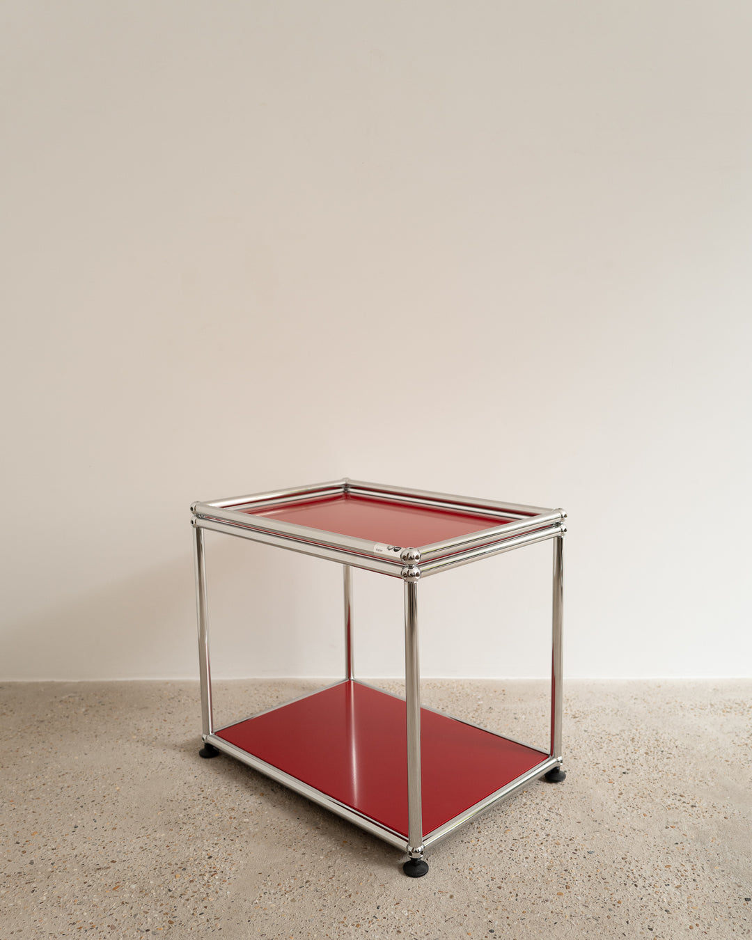 USM Haller side table red, in AM Designs showroom, Antwerpen