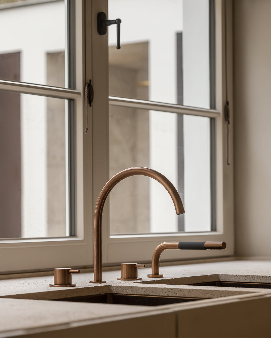 One-handle basin mixer in special finish, in AM Designs showroom, Antwerpen